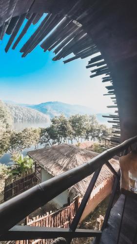 a view from the top of a building with a roof at Tropical Escape - Patal Eco Villas begnas in Rānīpauwa