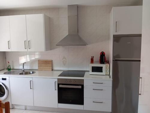 Η κουζίνα ή μικρή κουζίνα στο Apartamento 1 en Combarro , próximo a Sanxenxo