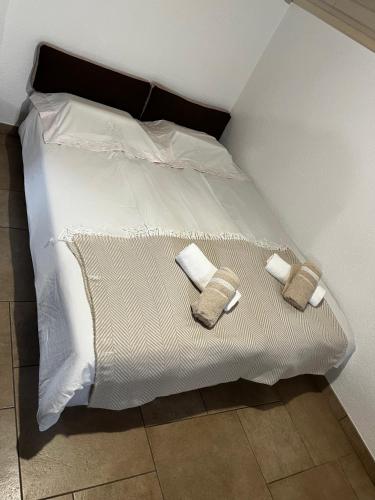 Postel nebo postele na pokoji v ubytování Apartma Zidanca Bele