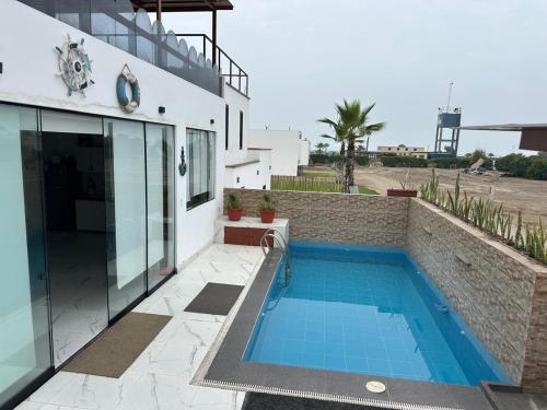 Πισίνα στο ή κοντά στο Casa Playa en Aucallama Beach Club