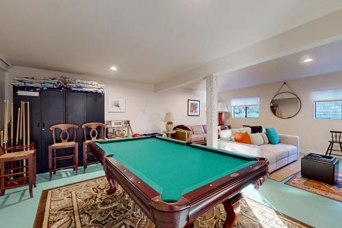 a living room with a pool table in it at Heron Escape in Bodega Bay