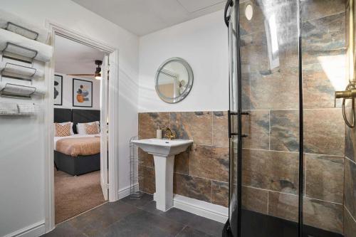 a bathroom with a sink and a shower at Host & Stay - Honeycomb House in Launceston