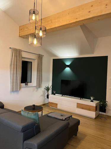 Posezení v ubytování Neue moderne Ferienwohnung mit Infrarot Sauna