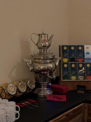 a silver trophy sitting on top of a table at Hotel Garni Alpenjuwel in Serfaus