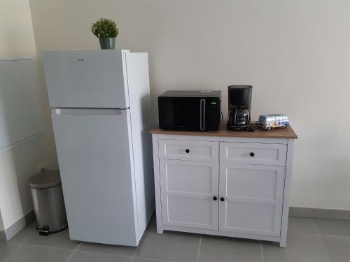 Η κουζίνα ή μικρή κουζίνα στο Appartement au bord de la plage et de la foret