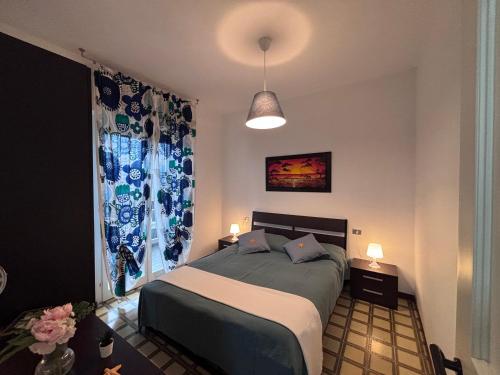 Ένα ή περισσότερα κρεβάτια σε δωμάτιο στο Green Marine A13 Silvi Vacanza