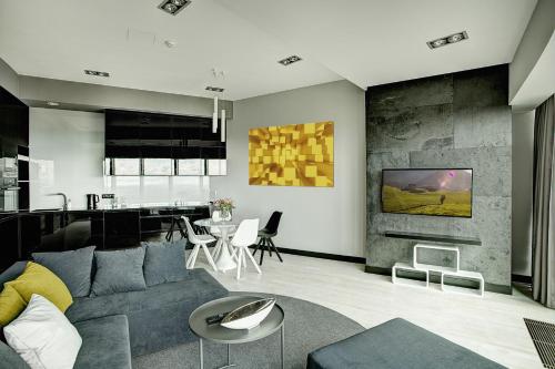 TV a/nebo společenská místnost v ubytování Apartamenty Sky Tower