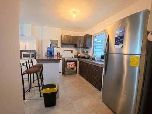 Virtuvė arba virtuvėlė apgyvendinimo įstaigoje Casa con Piscina junto al MAR
