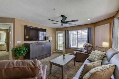 a living room with a couch and a flat screen tv at Gorgeous Condos at Thousand Hills - Heart of Branson - Spacious and Affordable in Branson