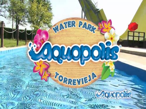 a sign in the water at a water park malibu at Villa Jacqueline la buena vida in Playa Flamenca