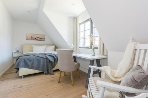 Postel nebo postele na pokoji v ubytování Zur Heiderose Haus 8 Villa Pebble