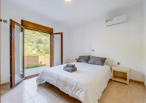 Postel nebo postele na pokoji v ubytování Casa Terra Verde