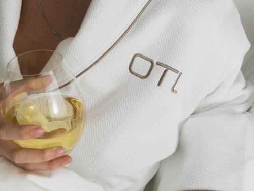 a man holding a wine glass in his hand at OTL Gouverneur Sherbrooke in Sherbrooke