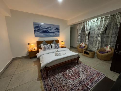 Postel nebo postele na pokoji v ubytování Arcane viewfinder homestay