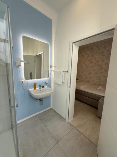 Koupelna v ubytování Hotel Astra
