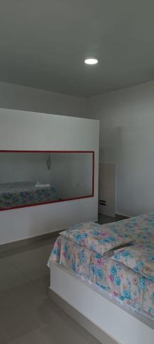 Postel nebo postele na pokoji v ubytování El Silencio Tiktoker