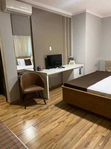 Μια τηλεόραση ή/και κέντρο ψυχαγωγίας στο Class Hotel Alfenas