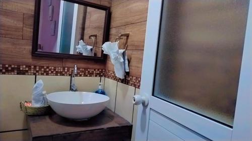 Ένα μπάνιο στο Casa Rosa