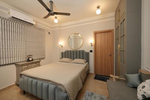 Postel nebo postele na pokoji v ubytování Cozy 3 BHK fully furnished apartment in Cochin