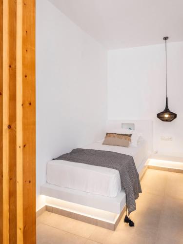 Katil atau katil-katil dalam bilik di Chanos Luxury Suites Paros