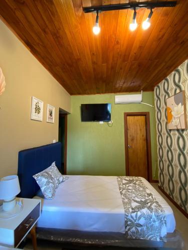 Ένα ή περισσότερα κρεβάτια σε δωμάτιο στο Doña Emilia Hotel Boutique
