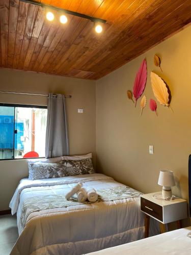 Ένα ή περισσότερα κρεβάτια σε δωμάτιο στο Doña Emilia Hotel Boutique
