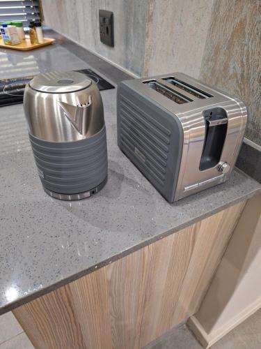 a toaster sitting on top of a counter at Studio 2 Churchill lane in Hillcrest