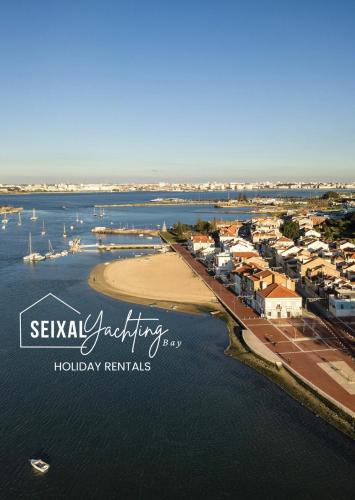 an aerial view of a harbor with boats in the water at Seixal Yachting Bay Vintage in Seixal