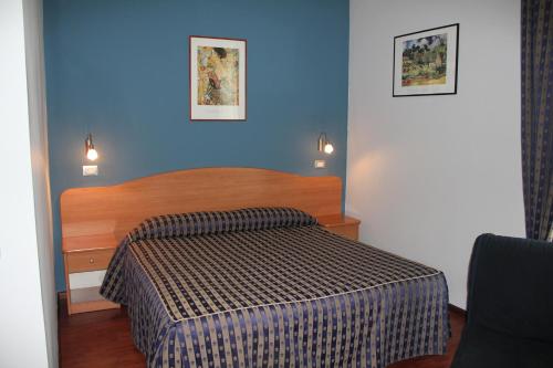 Postel nebo postele na pokoji v ubytování B&B Luna Blu