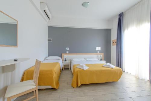 Katil atau katil-katil dalam bilik di Nautic Beach Hotel