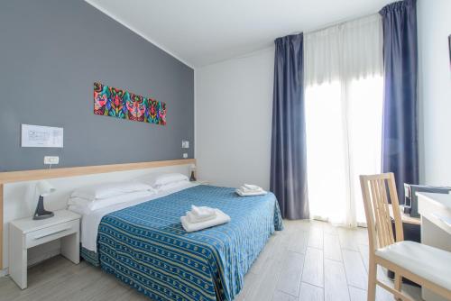 Katil atau katil-katil dalam bilik di Nautic Beach Hotel
