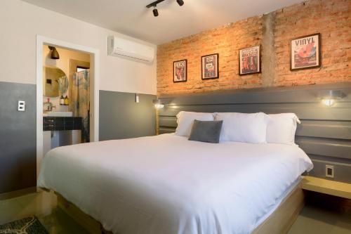 Cama ou camas em um quarto em Hotel NEXT