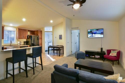 a living room with a couch and a table at Suter's Forte in Wawona