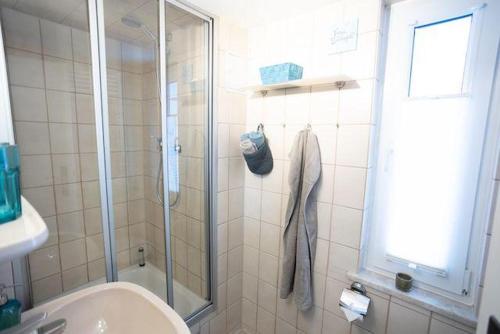 Koupelna v ubytování Hyggezeit-im-Bungalow-in-Wernigerode