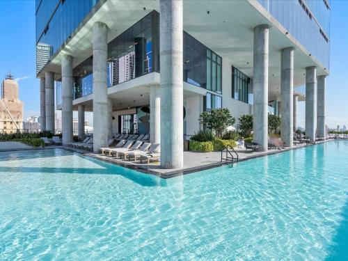a swimming pool in front of a building at Downtown by Miami Vacation Rentals in Miami