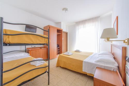 Katil atau katil-katil dalam bilik di Hotel Avana Mare