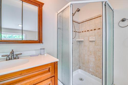 a bathroom with a shower and a sink at Charming Ballston Spa Home with Sauna and Private Pool in Ballston Spa