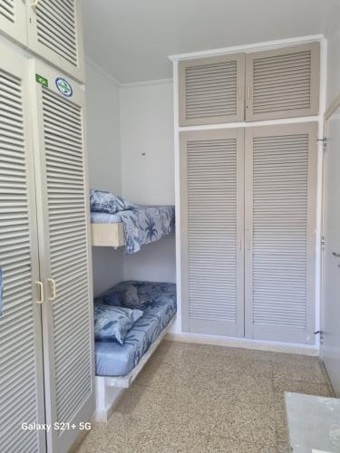 Katil atau katil-katil dalam bilik di Bela's Suítes- 60 m da praia de Barequeçaba