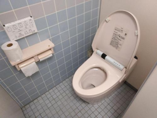 a bathroom with a toilet with the lid up at Ogawaya Ryokan - Vacation STAY 16050v in Tahara