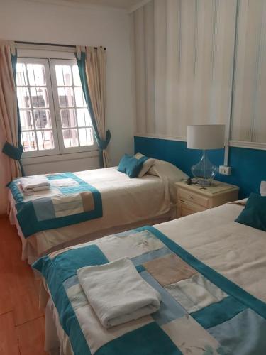 Hostal Viña Malvaにあるベッド