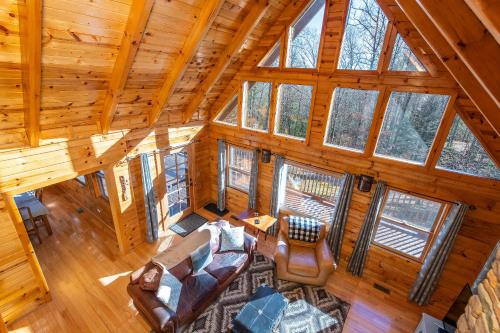 an overhead view of a living room in a log cabin at Mill Creek Point in Rogers