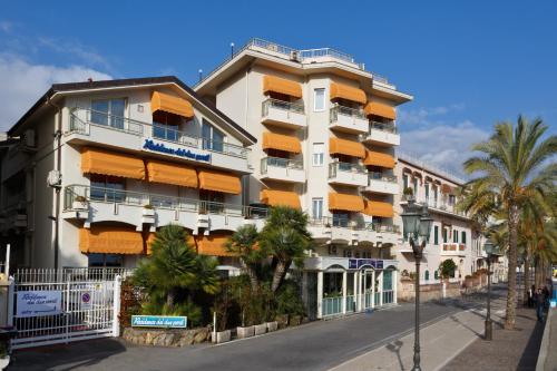 a city street filled with lots of tall buildings at Residence Dei Due Porti in Sanremo