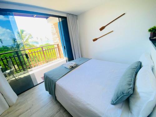 Ένα ή περισσότερα κρεβάτια σε δωμάτιο στο Villaggio Orizzonte