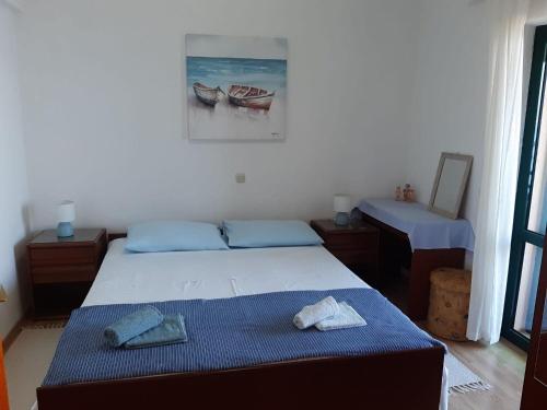 Posteľ alebo postele v izbe v ubytovaní Apartment Ruzmarin