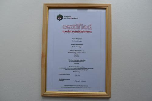 a framed picture of a corrected work statement at Mc Courts Cottage in Hilltown