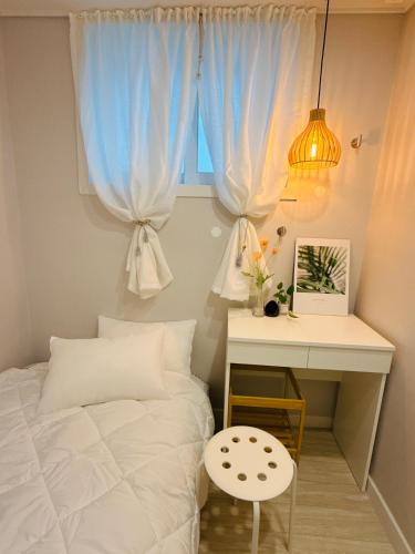 Letto o letti in una camera di GreeneStay Sindang DDP Seoul