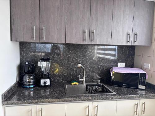 Dapur atau dapur kecil di Relaxing Beach Apartment,Sea Front Apart