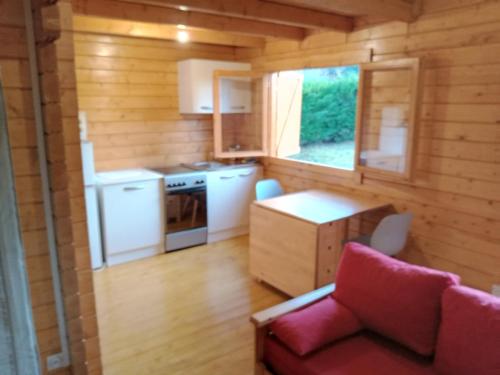 Kuchyň nebo kuchyňský kout v ubytování chalet le cocon de bois