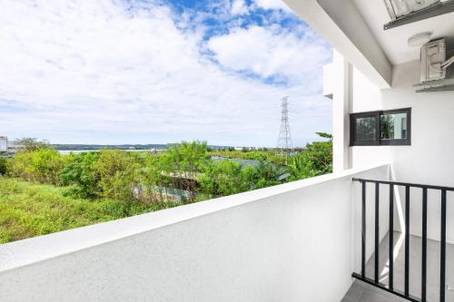 a view from the balcony of a house at 25Inn Hengchun Kenting in Nanwan