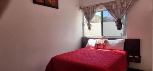 Ένα ή περισσότερα κρεβάτια σε δωμάτιο στο Hotel Posada San Luis